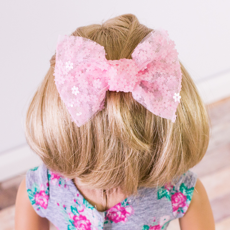 Large sequin hair bow